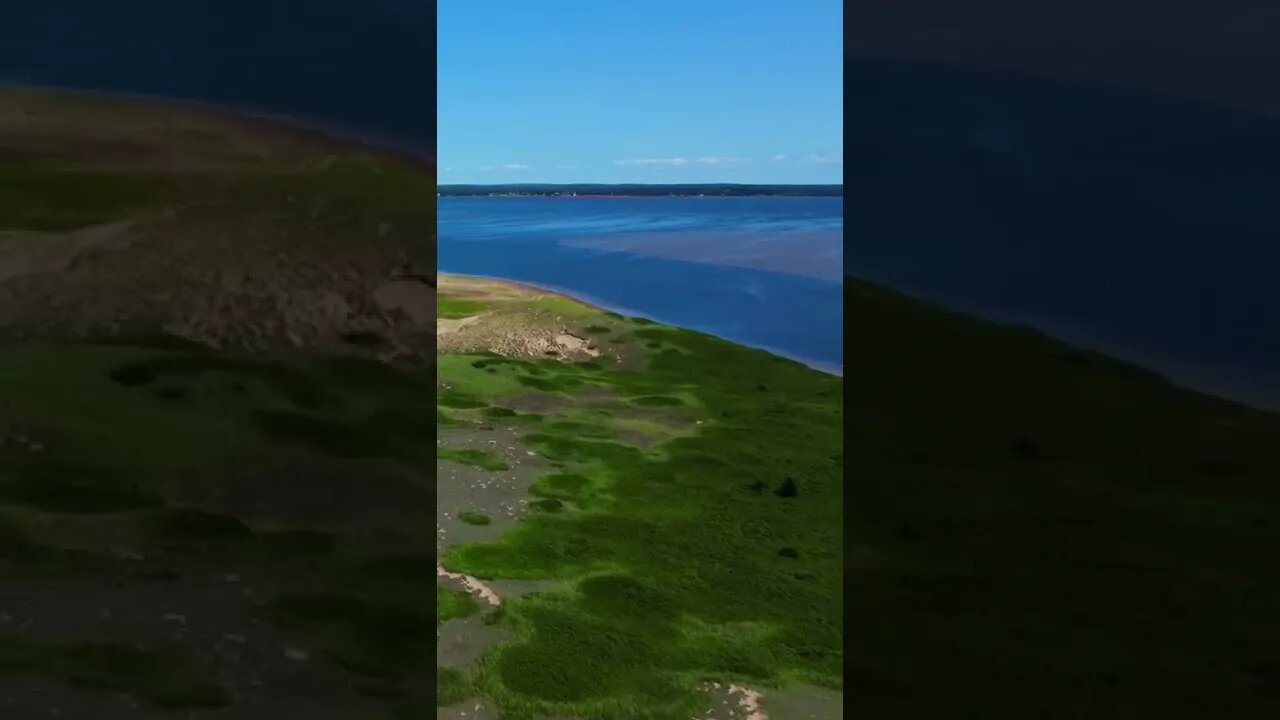 Flying over a green island