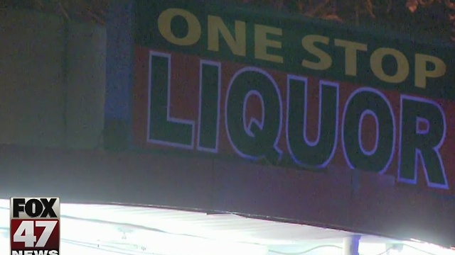 Suspect who shot man outside of Lansing liquor store still on the run