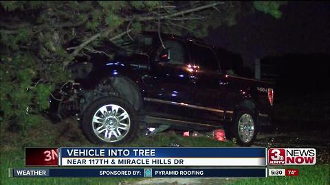 Vehicle into tree, 117th and Miracle Hills Drive