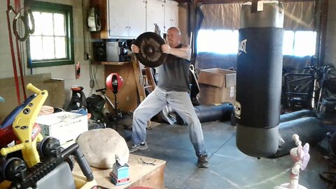 30 Second 35 lb Plate Raise Isometric In Horse Stance.