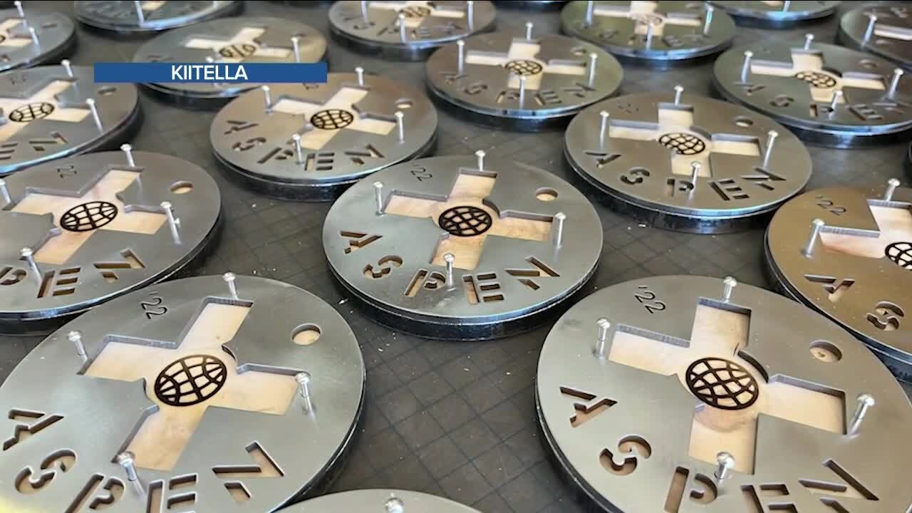 Artist creates X Games medals with pieces of aspen wood