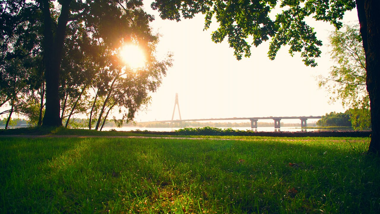 View of a park while a girl runs across