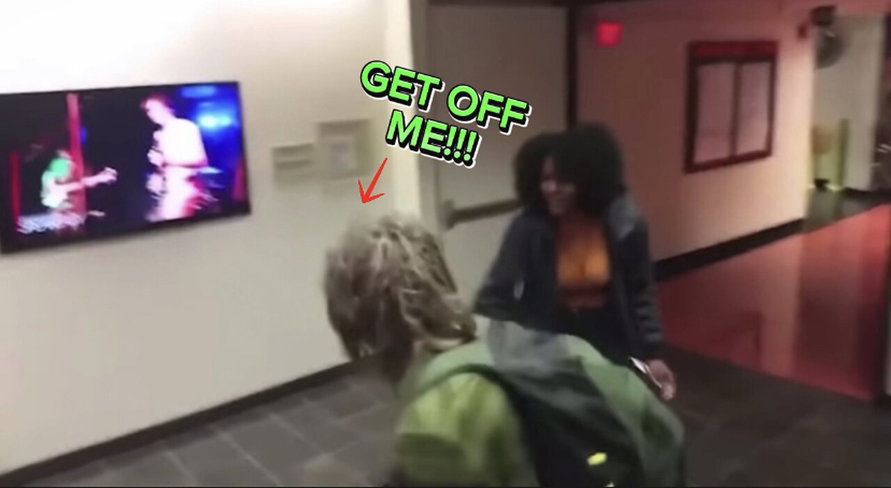 Women harasses man because of his hairstyle