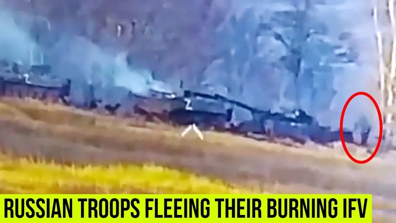 Russian soldiers escape their IFV heavily clad vehicle, after Ukrainian strike.