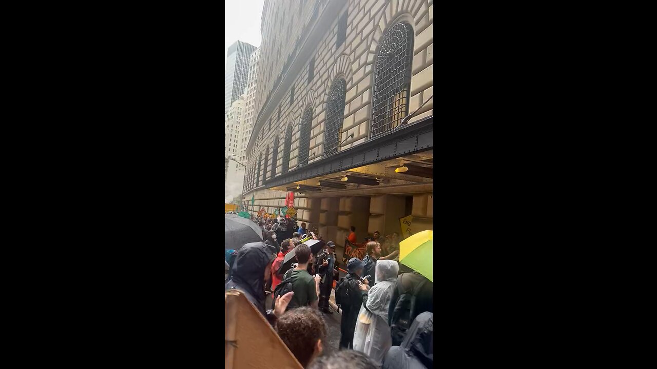 Climate change advocates are obstructing the entrances to the Federal Reserve in downtown Manhattan