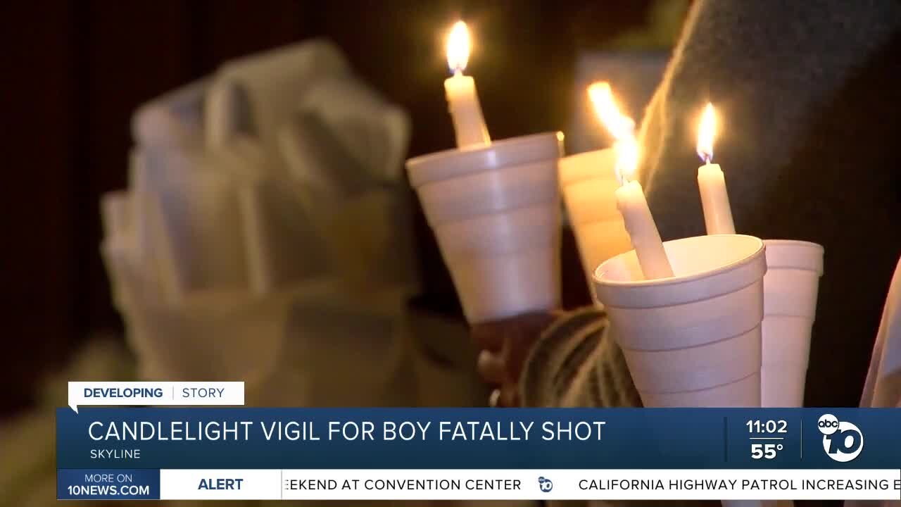 Family and friends hold vigil for boy hsot and killed in Skyline