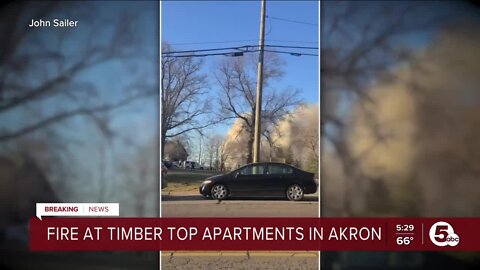 Akron firefighters battle blaze at Tree Top Trail apartments