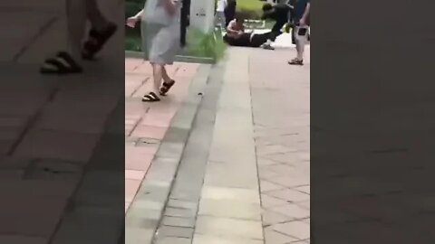 🥶🥶🥶🥶🧟 A Zombie like man is attacking people in the streets.