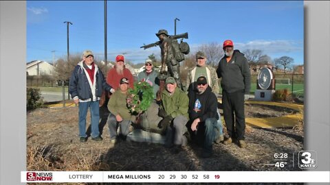 Omaha marines taking care of other marines