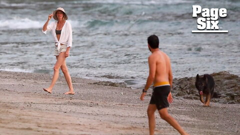 Gisele Bündchen, jiu-jitsu instructor Joaquim Valente enjoy beach day
