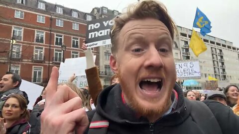 Protesters cheer as the march begins in London