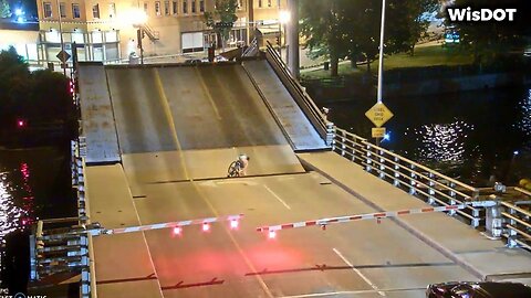 Woman cited for riding bike onto bridge as it was lifted