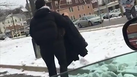 Woman Gives Homeless Man Coat
