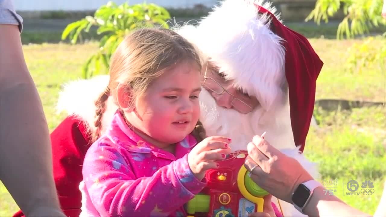 Santa Claus delivers Christmas joy to some Fort Pierce families