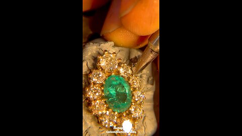 Hand making a vintage oval emerald and diamond gold ring ASMR