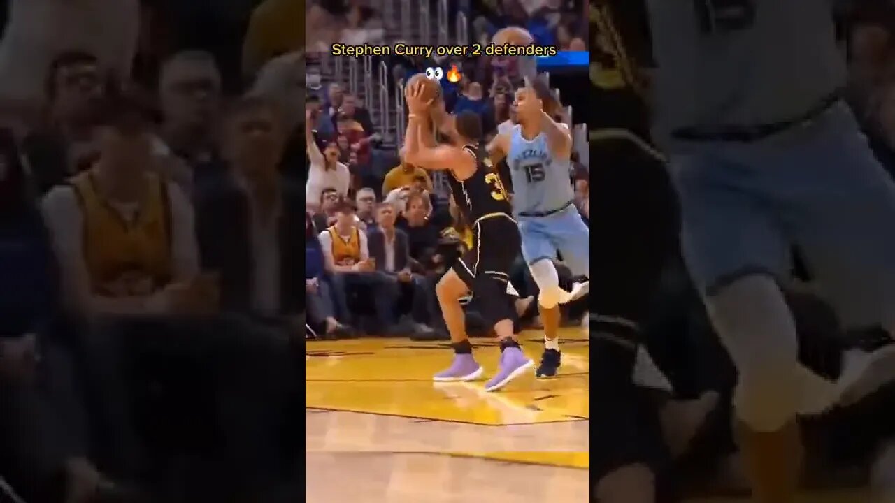 Stephen Curry over 2 defenders