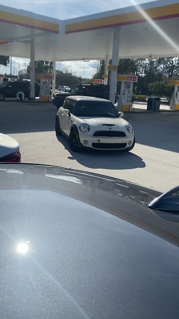 Fellow Truther in his "Punisher" Mini Cooper