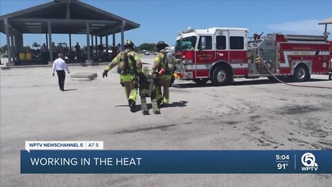 Palm Beach County firefighters face extreme heat during the summer