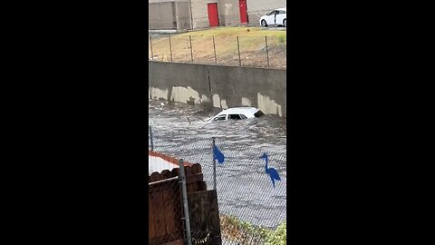 Cars washed away in canals in Los Angeles