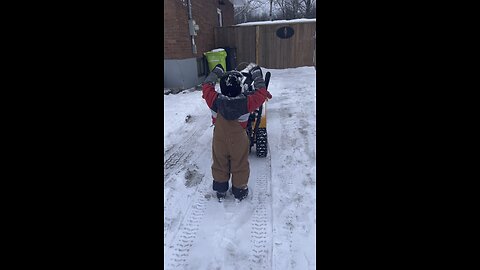 2yr old snow blowing