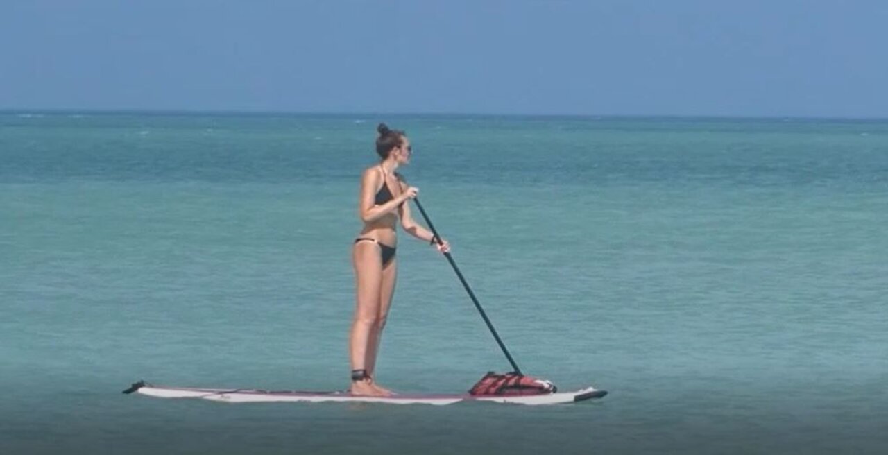 Paddleboarding on the sea, Isla Holbox, Yucatan, Mexico