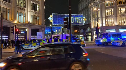 Heavy Police Presence Oxford Circus tube station. man arrested.