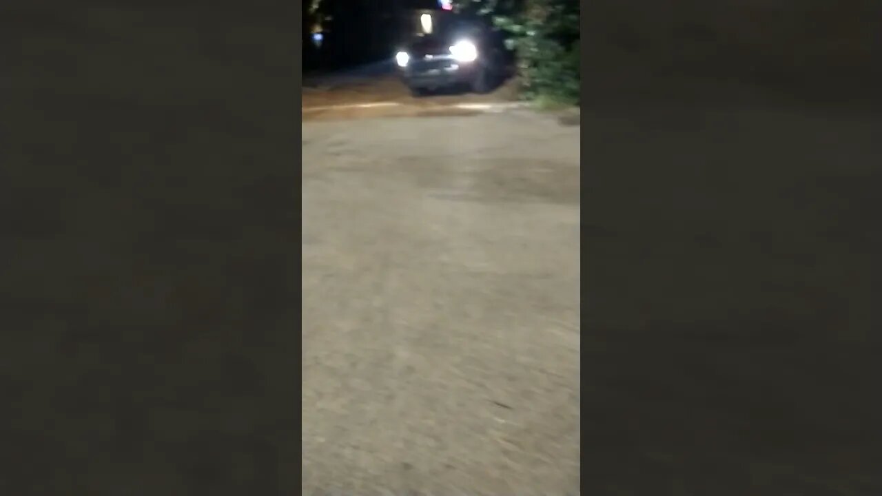 Gang Stalking creep in red truck