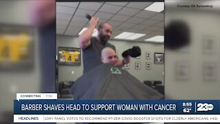 Barber shaves head to support woman with cancer
