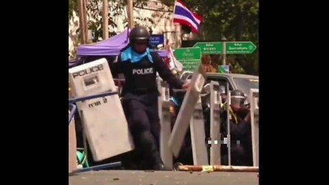 Riot Cop Tries To Kick Away Live Grenade - Situation Ends Like A Cartoon