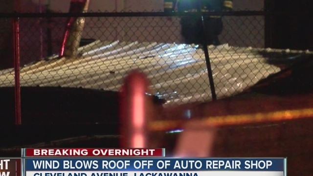 Roof blows off auto repair shop, causes outages