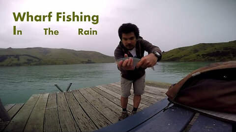 Fishing at a remote Wharf in the Rain