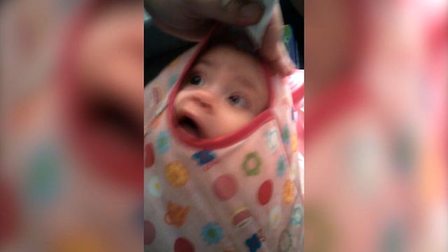 Baby Discovers New Way To Play Peekaboo