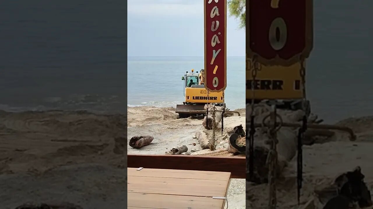 Excavator repairs the beach after the storm#viral #beach #sand