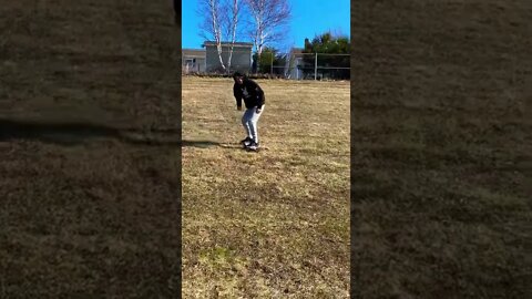 Long boarding wipe out on grass