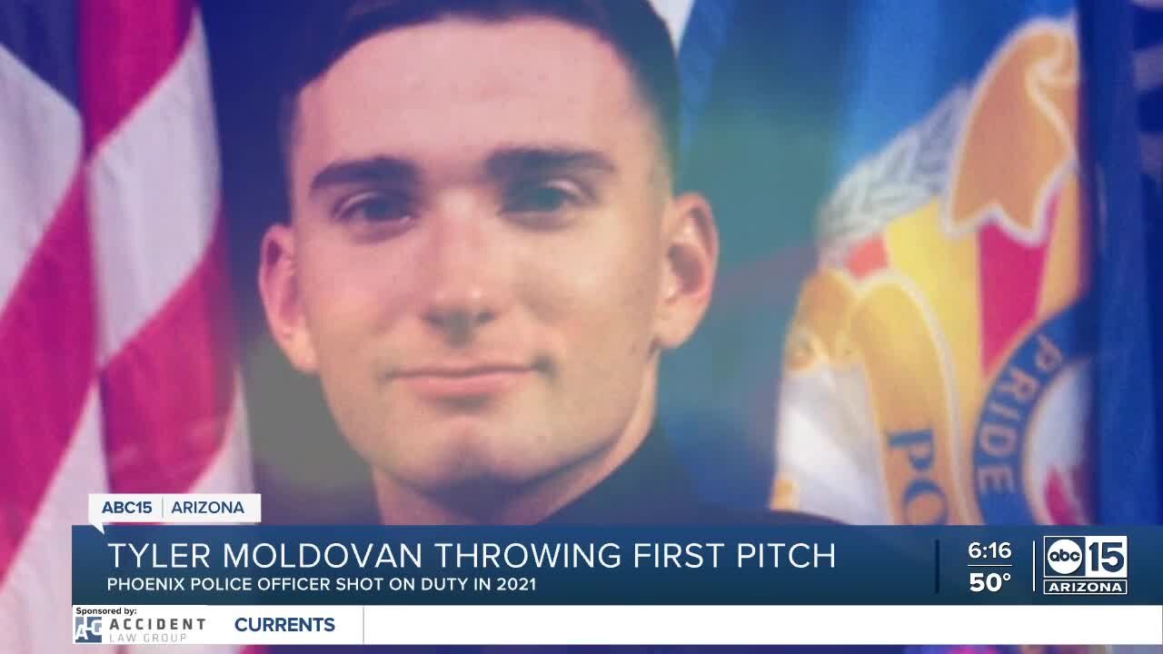 Phoenix Officer Tyler Moldovan throwing first pitch at D-backs home opener