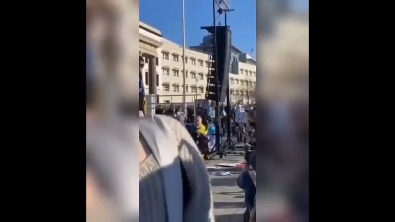 Berlin. Bundestag. Ukrainian child and a crowd of hundreds shout out loud and repeat the Banderite Nazi slogans of WWII.