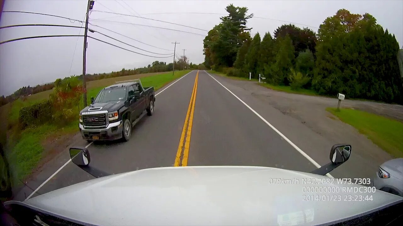 Car Ran A Stop Sign Right on Front of a Semi Truck