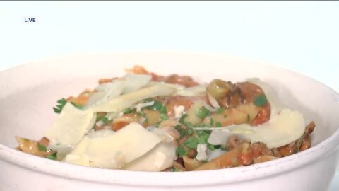 Cooking Bolognese pasta at Centro Cafe in Riverwest