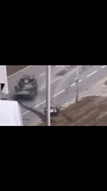 Russian Tank Runs Over Civilian Vehicle In Ukraine