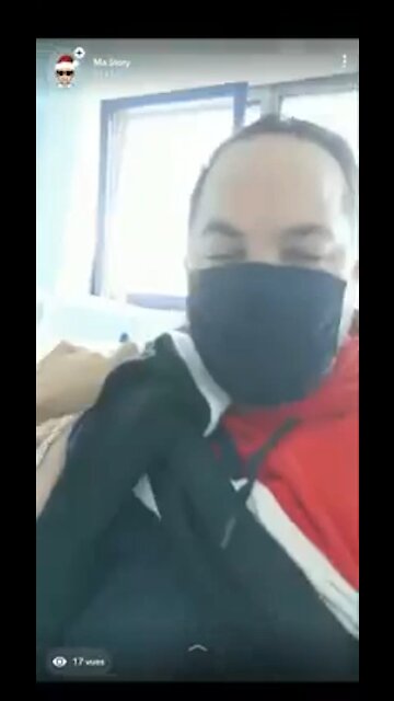 MAN CHARGES PHONE WITH HIS ARM AFTER VACCINE