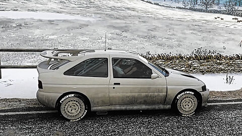 1991 Ford Escort Cosworth. A fast and sticky car. Sadly, my driving ability sickens me.