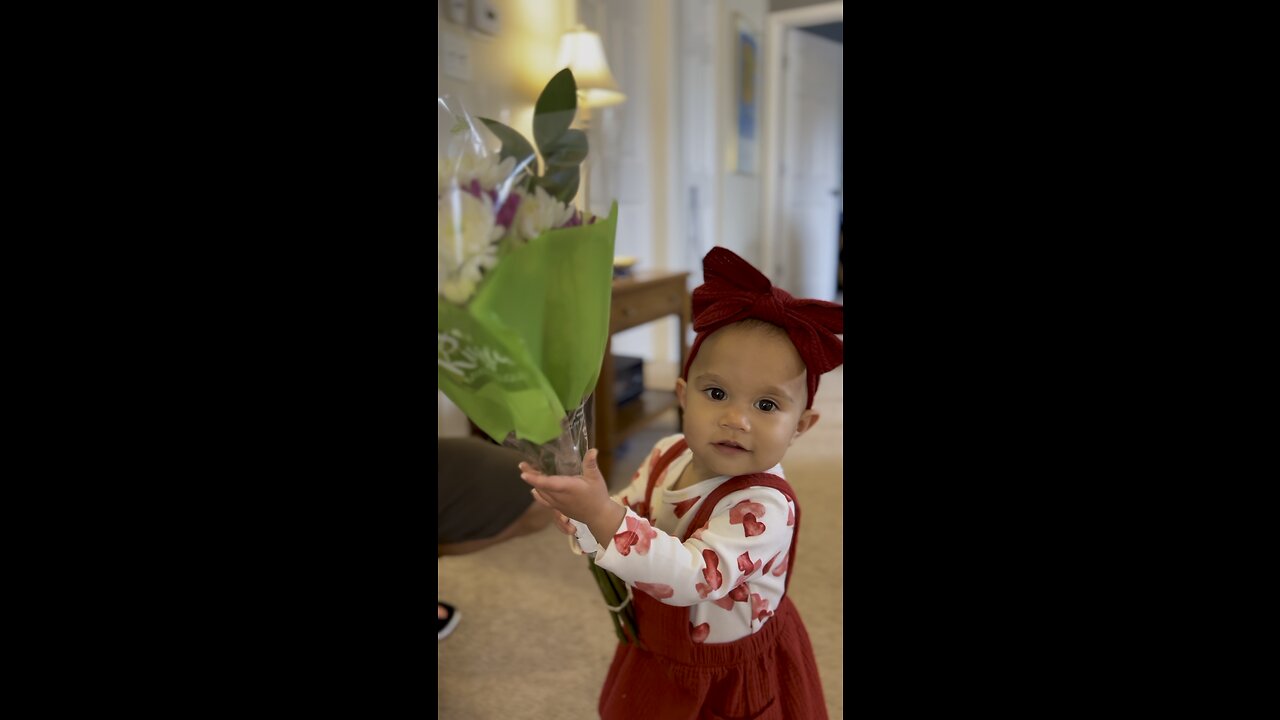 Baby gets Valentine’s Day flowers from her dada!