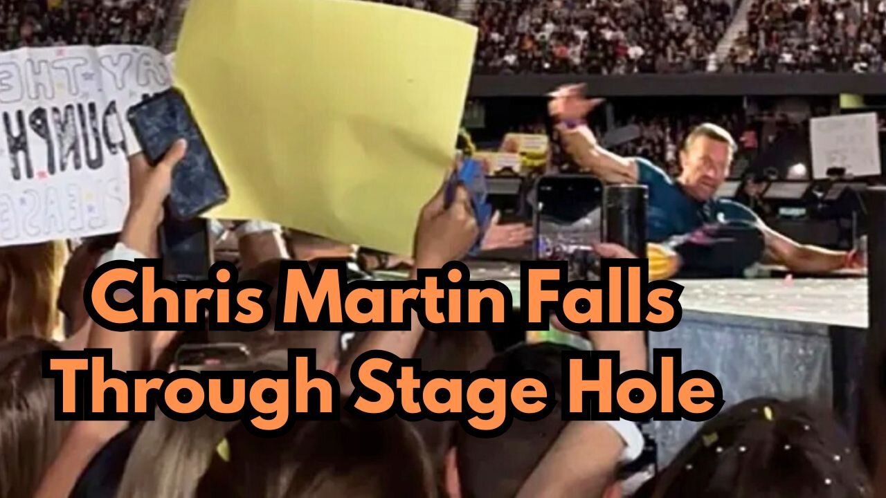 Chris Martin Falls Through Stage Hole