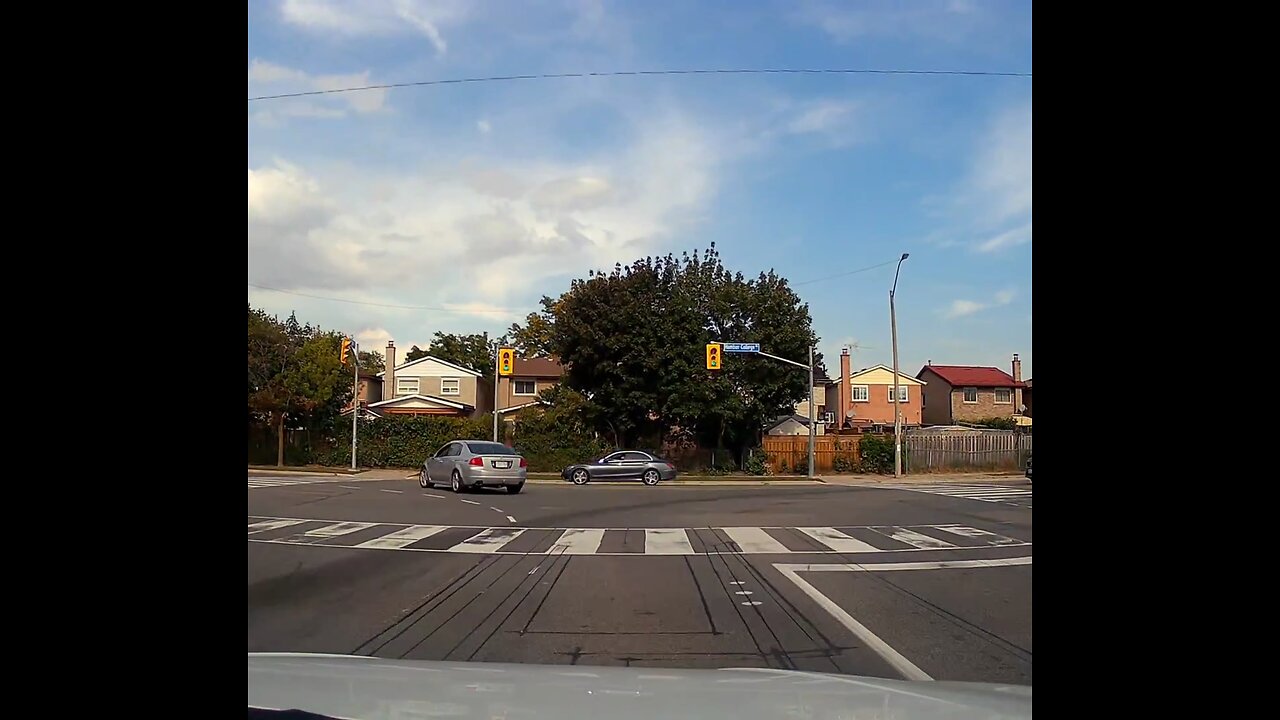 Vehicle Runs Red Light In Toronto