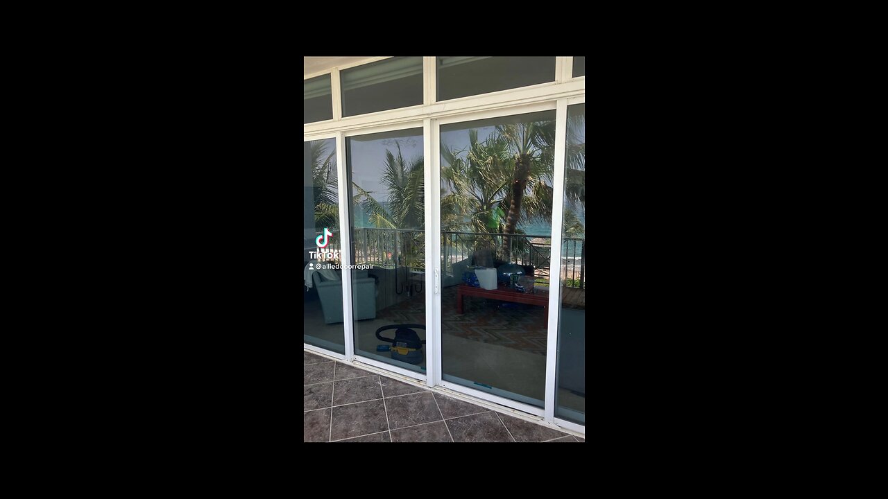 Hurricane impact sliding glass door repair; roller and track replacement, in Deerfield Beach, Fl.