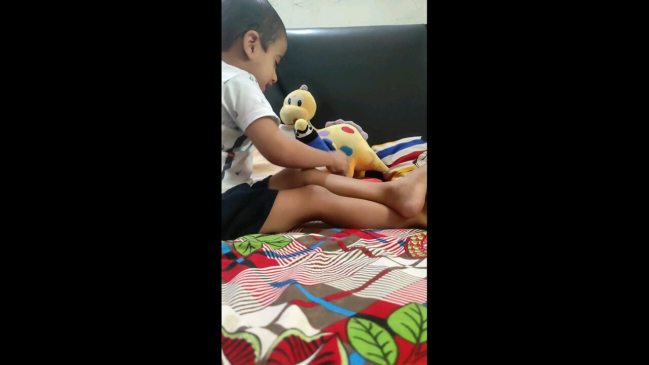 Lil boy playing