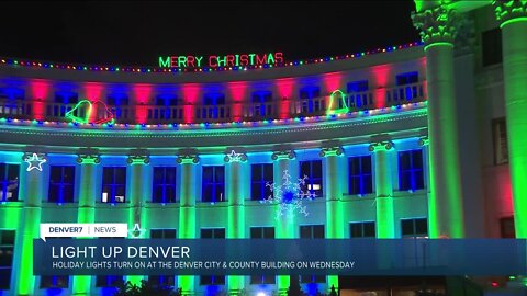 Holiday lights turn on at the Denver City and County Building Wednesday