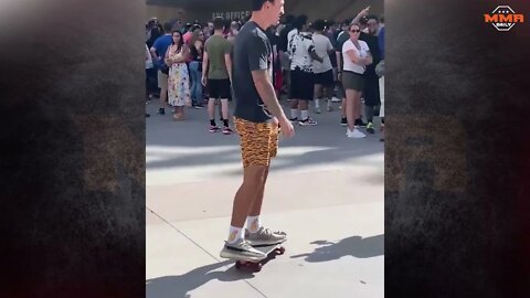 Max Holloway skateboards up to T-Mobile arena at UFC 264