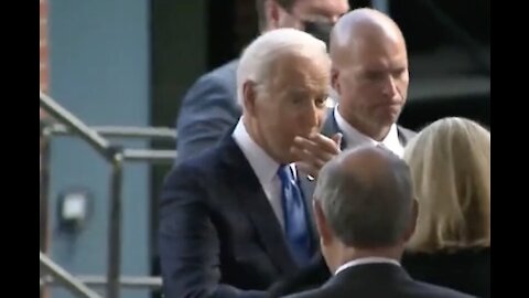 WATCH: Biden Realizes He Forgot His Mask, Then Greets Several People Anyways