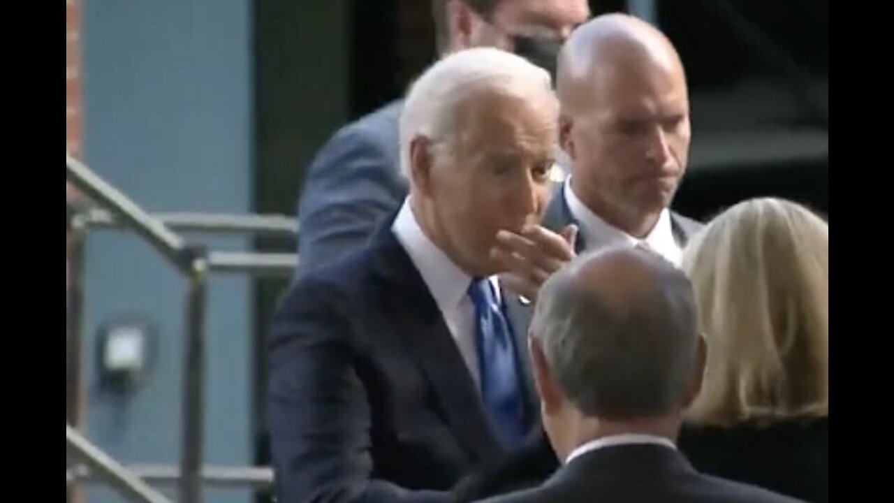 WATCH: Biden Realizes He Forgot His Mask, Then Greets Several People Anyways